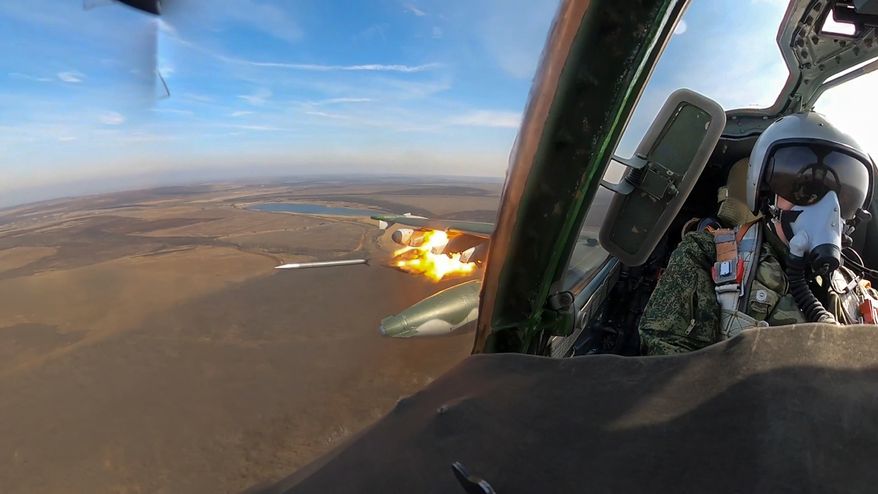 This photo taken from video released by the Russian Defense Ministry Press Service on Wednesday, March 27, 2024, shows a Su-25 ground attack jet of the Russian air force firing rockets during a mission over Ukraine. (Russian Defense Ministry Press Service via AP) **FILE**