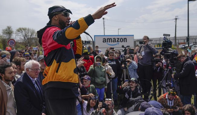 FILE - Chris Smalls, president of the Amazon Labor Union, speaks at a rally outside an Amazon warehouse on Staten Island in New York, April 24, 2022. Within union ranks, some felt Smalls was spending too much time traveling and giving speeches instead of organizing workers on Staten Island. (AP Photo/Seth Wenig, File)