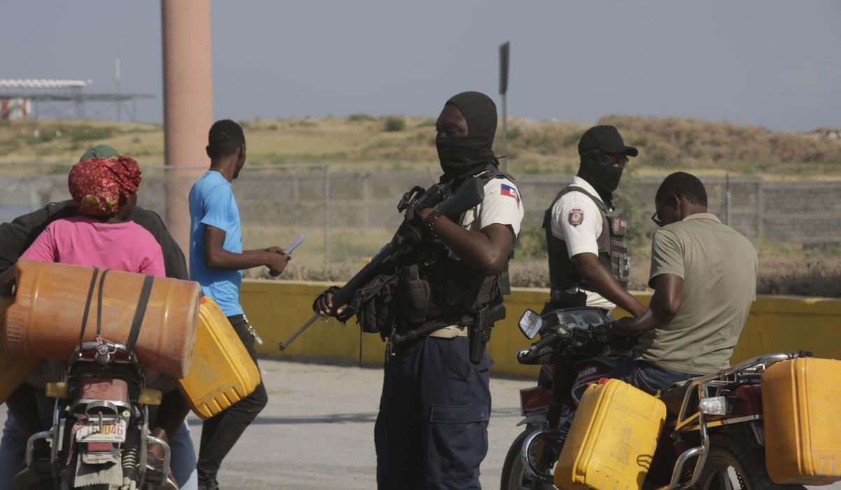 NextImg:Haiti police recover hijacked cargo ship in rare victory after 5-hour shootout with gangs