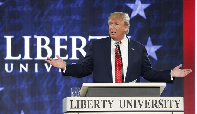 Then-Republican presidential candidate Donald Trump gestures during a speech at Liberty University in Lynchburg, Va., Jan. 18, 2016. For conservative, anti-abortion Christians, former President Donald Trump delivered in four years what no other Republican before him had been able to do. He transformed the U.S. Supreme Court into a conservative majority that would go on to overturn Roe v. Wade. (AP Photo/Steve Helber) **FILE**