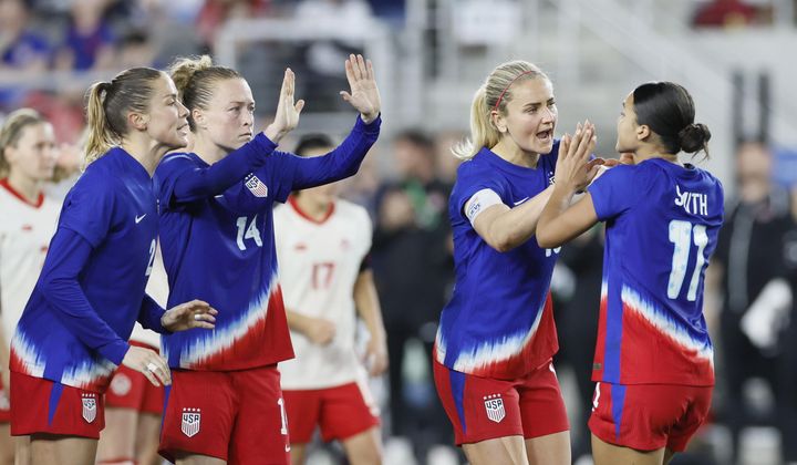 United States&#x27; Sophia Smith, right, celebrates her goal against Canada with teammates during the shoot out of a SheBelieves Cup women&#x27;s soccer match Tuesday, April 9, 2024, in Columbus, Ohio. (AP Photo/Jay LaPrete)