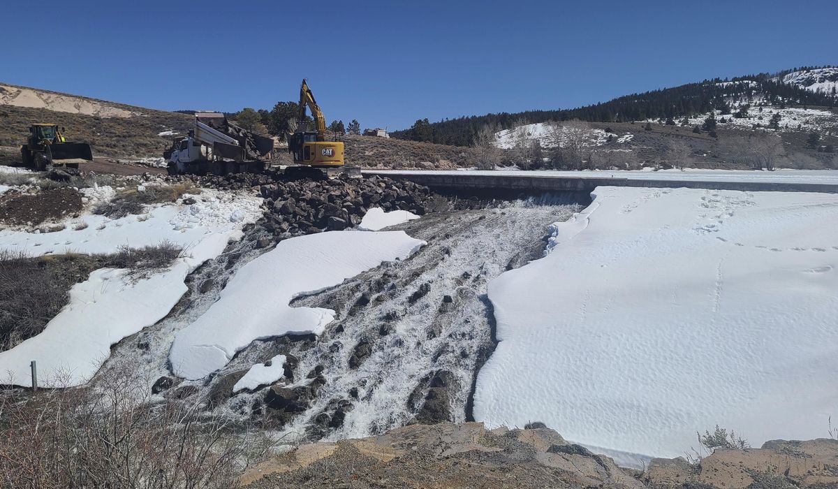 NextImg:Water pouring out of rural Utah dam through 60-foot crack, putting nearby town at risk