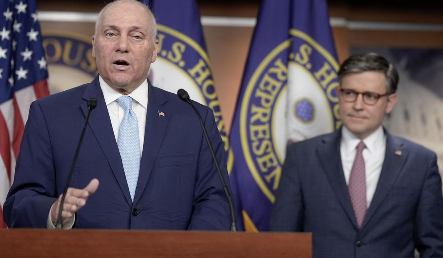 Majority Leader Steve Scalise, R-La., speaks as House Speaker Mike Johnson, R-La., listens during a news conference on Capitol Hill Wednesday, April 10, 2024, in Washington. (AP Photo/Mariam Zuhaib)