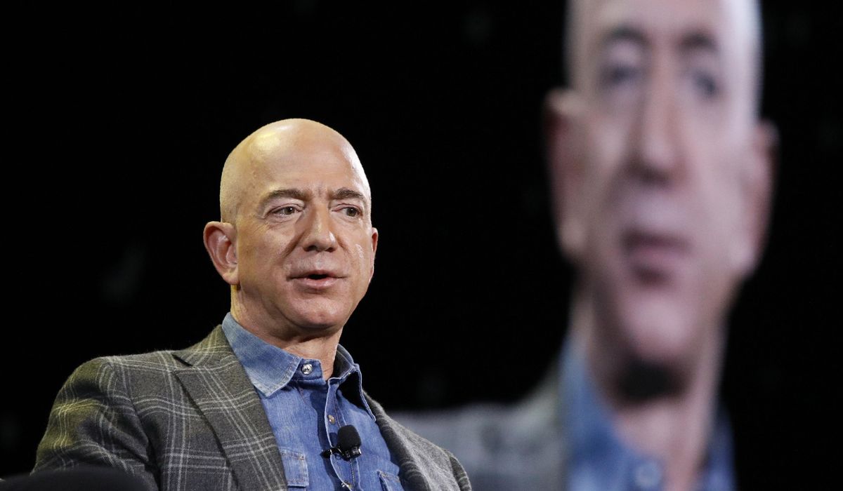 NextImg:Washington Post cartoonist quits after depiction of Bezos kneeling to Trump was axed