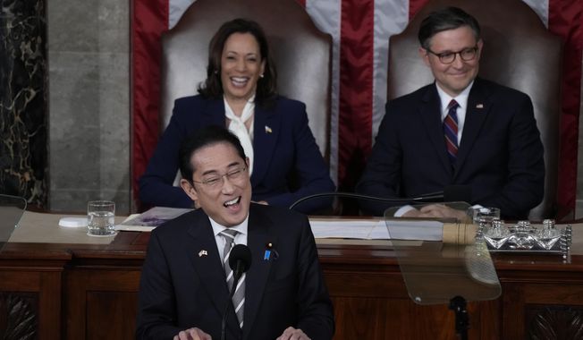 Japan&#x27;s Prime Minister Fumio Kishida addresses a joint meeting of Congress in the House chamber, Thursday, April 11, 2024, at the Capitol in Washington, as Vice President Kamala Harris and Speaker of the House Mike Johnson, R-La., look on. (AP Photo/Jacquelyn Martin)