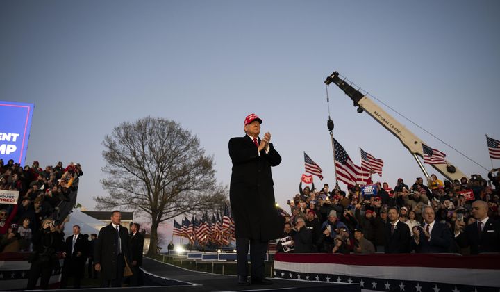Former U.S. President Donald Trump greets attendees during a campaign event in Schnecksville, Pa., on Saturday, April 13, 2024. (AP Photo/Joe Lamberti)