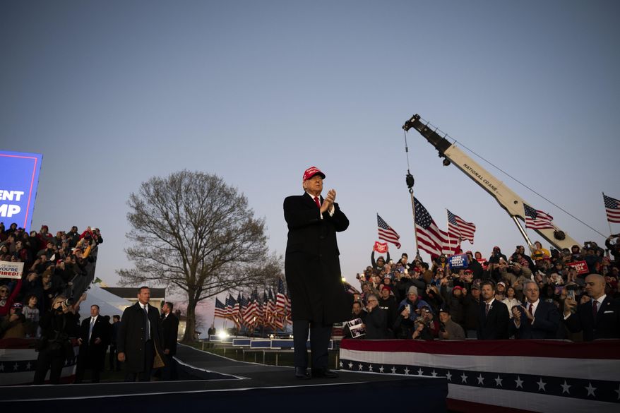 Former U.S. President Donald Trump greets attendees during a campaign event in Schnecksville, Pa., on Saturday, April 13, 2024. (AP Photo/Joe Lamberti)