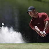 Tiger Woods hits from the bunker on the 16th hole during final round at the Masters golf tournament at Augusta National Golf Club Sunday, April 14, 2024, in Augusta, Ga. (AP Photo/Charlie Riedel). **FILE**