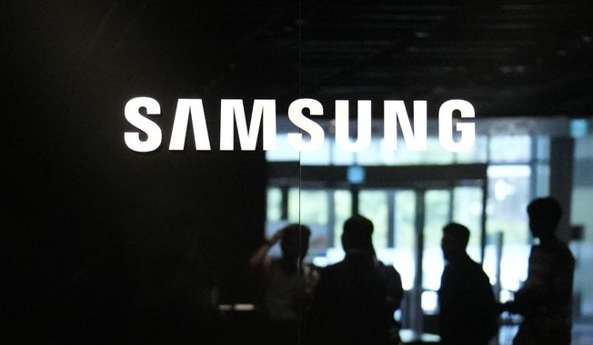 The logo of the Samsung Electronics Co. is seen during a media tour at Samsung Electronics&#x27; headquarters in Suwon, South Korea, June 13, 2023. The Biden administration has reached an agreement to provide up to $6.4 billion in direct funding for Samsung Electronics to develop a computer chip manufacturing and research cluster in Texas. The funding announced Monday, April 15, 20204, by the Commerce Department is part of a total investment in the cluster that, with private money, is expected to exceed $40 billion. (AP Photo/Lee Jin-man, File)