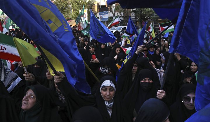 Iranian demonstrators attend an anti-Israeli gathering at the Felestin (Palestine) Sq. in Tehran, Iran, Monday, April 15, 2024. World leaders are urging Israel not to retaliate after Iran launched an attack involving hundreds of drones, ballistic missiles and cruise missiles. (AP Photo/Vahid Salemi)