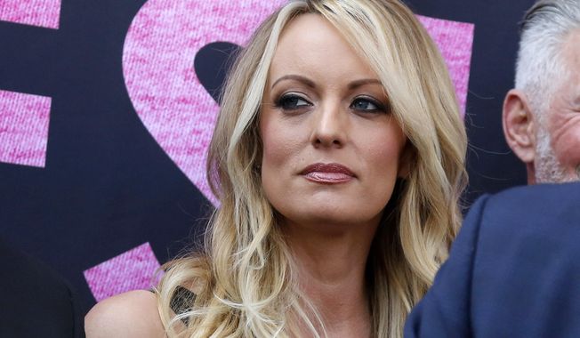Stormy Daniels appears at an event, May 23, 2018, in West Hollywood, Calif. The hush money trial of former President Donald Trump begins Monday, April 15, 2024, with jury selection. It&#x27;s the first criminal trial of a former U.S. commander-in-chief. The charges in the trial center on $130,000 in payments that Trump&#x27;s company made to his then-lawyer, Michael Cohen. He paid that sum on Trump&#x27;s behalf to keep Daniels from going public, a month before the election, with her claims of a sexual encounter with Trump a decade earlier. (AP Photo/Ringo H.W. Chiu, File)