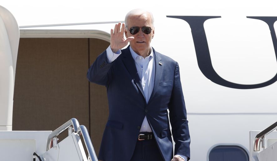 President Biden waves as he boards Air Force One, Tuesday, April 16, 2024, at Andrews Air Force Base, Md. Biden is headed to Pennsylvania. (AP Photo/Luis M. Alvarez)