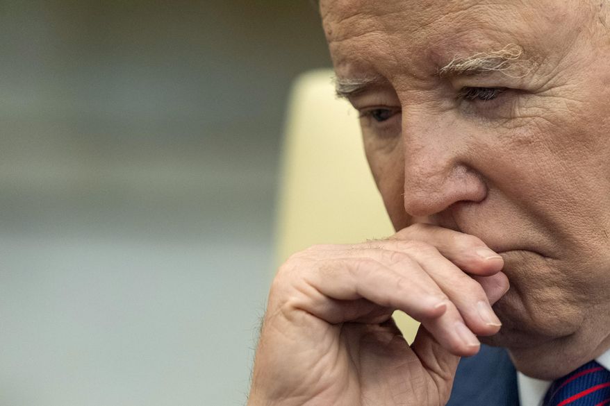 President Joe Biden listens as he meets with Iraq's Prime Minister Shia al-Sudani in the Oval Office of the White House, Monday, April 15, 2024, in Washington. Biden’s latest plan for student loan cancellation is moving forward as a proposed regulation, offering him a fresh chance to deliver on a campaign promise and energize young voters ahead of the November election. The Education Department on Tuesday filed paperwork for a new regulation that would deliver the cancellation the Democratic president announced last week. (AP Photo/Alex Brandon, File)