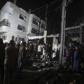Palestinians inspect the rubble of destroyed buildings of the Abo al Hanood family after an Israeli airstrike in Rafah refugee camp, southern Gaza Strip, Wednesday, April 17, 2024. Palestinian medics said several residents, including children, were killed in the airstrike. (AP Photo/Ismael Abu Dayyah)