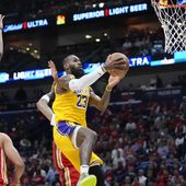 Los Angeles Lakers forward LeBron James (23) goes to the basket in the first half of an NBA basketball play-in tournament game against the New Orleans Pelicans, Tuesday, April 16, 2024, in New Orleans. (AP Photo/Gerald Herbert)