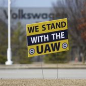 FILE - A &quot;We stand with the UAW&quot; sign appears outside of the Volkswagen plant in Chattanooga, Tenn., on Dec. 18, 2023. Workers at at the Tennessee factory are scheduled to finish voting Friday, April 19, 2024, on whether they want to be represented by the United Auto Workers union. (Olivia Ross/Chattanooga Times Free Press via AP, File)