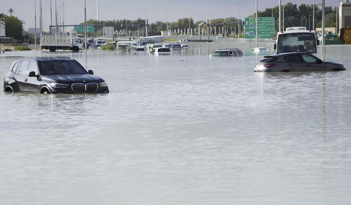 NextImg:Storm dumps record rain across the desert nation of UAE and floods the Dubai airport