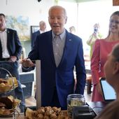 President Joe Biden arrives at Zummo&#x27;s Cafe, Wednesday morning, April 17, 2024, in Scranton, Pa., with Scranton Mayor Paige Cognetti, right. (AP Photo/Alex Brandon)