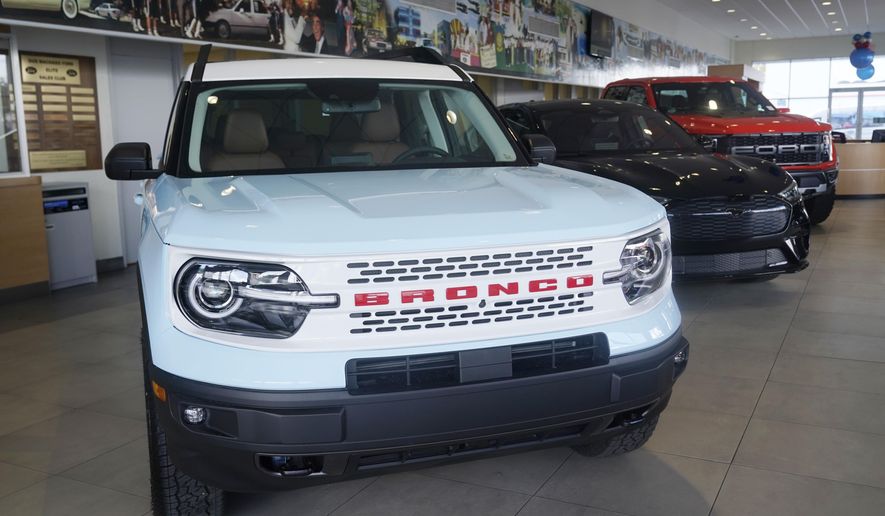 A Ford Bronco is displayed at a Gus Machado Ford dealership on Jan. 23, 2023, in Hialeah, Fla. Ford is recalling more than 456,000 Bronco Sport and Maverick vehicles, on Wednesday, April 17, 2024, due to a battery detection issue that can result in loss of drive power. (AP Photo/Marta Lavandier, File)