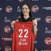 Indiana Fever&#x27;s Caitlin Clark holds her jersey following a WNBA basketball news conference, Wednesday, April 17, 2024, in Indianapolis. (AP Photo/Darron Cummings)