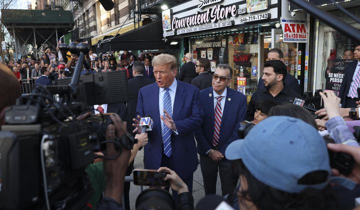 Former president Donald Trump, talks to members of the media while visiting a bodega, Tuesday, April 16, 2024, who&#x27;s owner was attacked last year in New York. Fresh from a Manhattan courtroom, Donald Trump visited a New York bodega where a man was stabbed to death, a stark pivot for the former president as he juggles being a criminal defendant and the Republican challenger intent on blaming President Joe Biden for crime. Alba&#x27;s attorney, Rich Cardinale, second from left, and Fransisco Marte, president of the Bodega Association, looked on. (AP Photo/Yuki Iwamura)