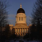 The Maine State House stands at sunrise, March 16, 2023, in Augusta, Maine. The Maine Legislature moved in fits and starts toward adjournment on Wednesday, April 17, 2024, with unfinished business including final votes on a series of gun safety bills that were introduced after the deadliest shooting in state history last fall. (AP Photo/Robert F. Bukaty, File)