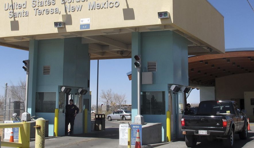 FILE - Traffic crosses from Mexico into the United States at a border station in Santa Teresa, N.M., in this photo made in March 14, 2012. The U.S. Border Patrol is asserting its right to seize cannabis shipments — including state-authorized commercial supplies — amid complaints of licensed cannabis providers that more than $300,000 worth of marijuana has been confiscated in recent months at Border Patrol highway checkpoints in southern New Mexico. (AP Photo/Jeri Clausing, File)