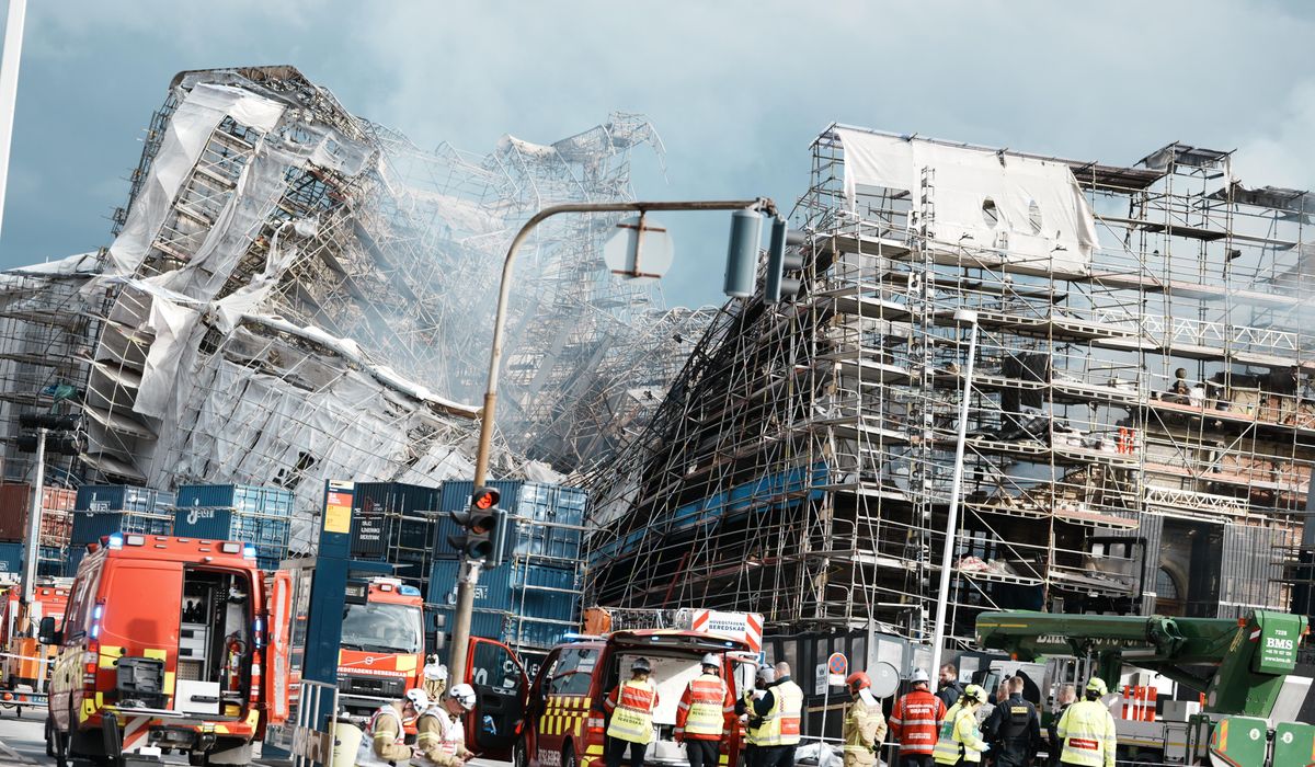 NextImg:Firefighters to tackle scaffolding dangling outside ruins of fire-ravaged Danish landmark