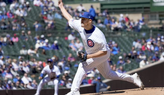 Chicago Cubs starting pitcher Jameson Taillon delivers during the first inning of a baseball game against the Miami Marlins Friday, April 19, 2024, in Chicago. (AP Photo/Charles Rex Arbogast)