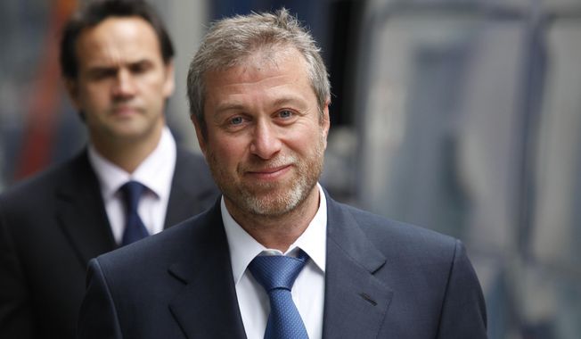 The owner of England&#x27;s Chelsea Football Club, Russian tycoon Roman Abramovich, as he leaves court in London, Oct. 4, 2011. Soccer club Vitesse Arnhem has been docked 18 points and will be relegated from the Netherlands top division. The club has been under investigation for ties to sanctioned Russian oligarch Roman Abramovich, the former owner of Chelsea. (AP Photo/Lefteris Pitarakis, File)