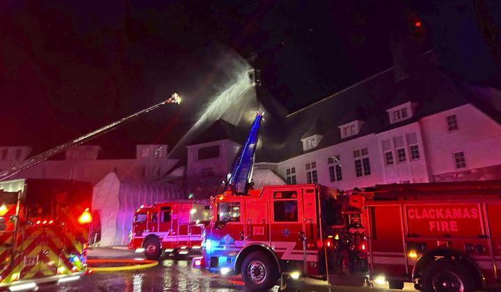 Firefighters extinguish a fire at Oregon&#x27;s historic Timberline Lodge, which was featured in Stanley Kubrick&#x27;s 1980 film &quot;The Shining,&quot; Thursday evening, April 18, 2024, in Government Camp, Ore. (Clackamas Fire Department via AP)