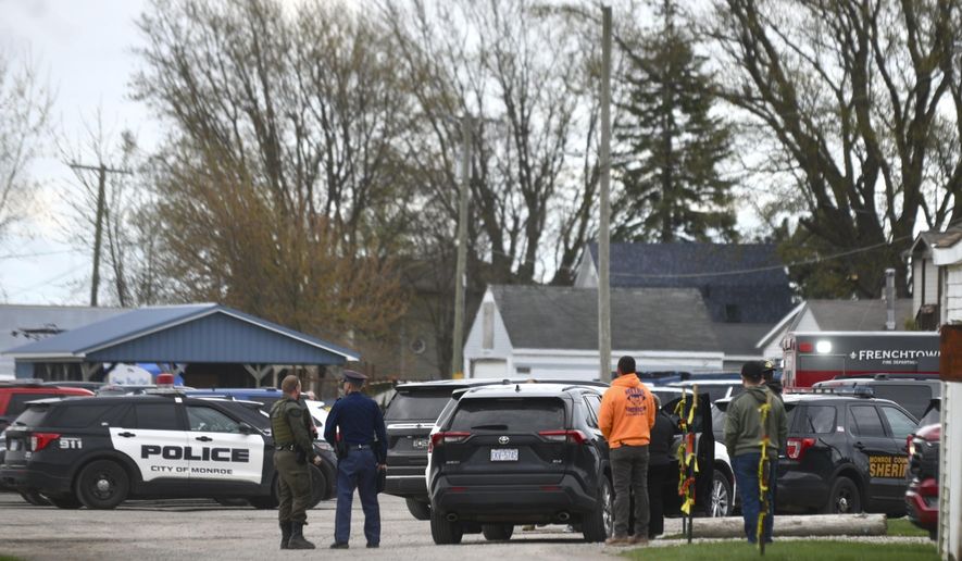 Authorities respond to the Swan Creek Boat Club after a driver crashed a vehicle through a building where a children&#x27;s birthday party was taking place, Saturday, April 20, 2024, in Berlin Township, Mich. (Kathleen Kildee/Detroit News via AP)