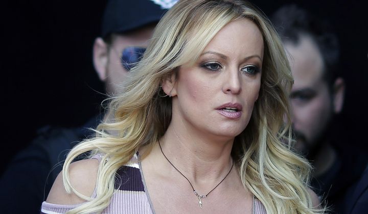Stormy Daniels arrives at an event in Berlin, on Oct. 11, 2018. The porn actor received a $130,000 payment from Donald Trump&#x27;s former lawyer Michael Cohen as part of his hush-money efforts. Cohen paid Daniels to keep quiet about what she says was a sexual encounter with Trump years earlier. Trump denies having sex with Daniels. Attorney Keith Davidson testified Tuesday how he leveraged media relationships to shop salacious stories about Donald Trump from Playboy model Karen McDougal and porn star Stormy Daniels — both of whom received payments from allies of the GOP nominee during his 2016 campaign. (AP Photo/Markus Schreiber, File)