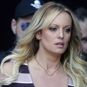 Stormy Daniels arrives at an event in Berlin, on Oct. 11, 2018. The porn actor received a $130,000 payment from Donald Trump&#x27;s former lawyer Michael Cohen as part of his hush-money efforts. Cohen paid Daniels to keep quiet about what she says was a sexual encounter with Trump years earlier. Trump denies having sex with Daniels. Attorney Keith Davidson testified Tuesday how he leveraged media relationships to shop salacious stories about Donald Trump from Playboy model Karen McDougal and porn star Stormy Daniels — both of whom received payments from allies of the GOP nominee during his 2016 campaign. (AP Photo/Markus Schreiber, File)