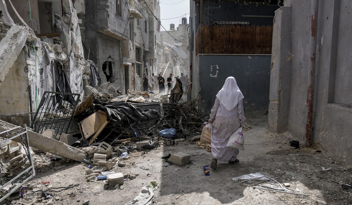 NextImg:Israeli strikes on Gaza city of Rafah kill 22, mostly children, as U.S. advances aid package