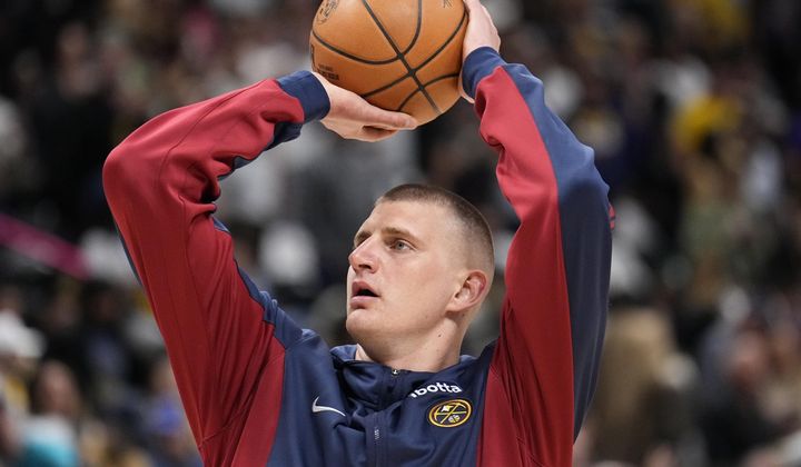 Denver Nuggets center Nikola Jokic warms up prior to Game 1 of an NBA basketball first-round play off game against the Los Angeles Lakers, Saturday, April 20, 2024, in Denver. (AP Photo/Jack Dempsey) **FILE^^