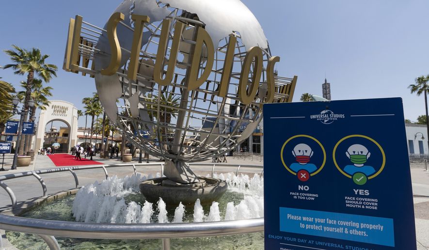 The Universal Studios Hollywood officially reopens to the public at 25% capacity with COVID-19 protocols in place in Los Angeles, on April 16, 2021. A tram accident at Universal Studios in Los Angeles injured multiple people Saturday night, April 20, 2024, authorities and the company said. (AP Photo/Damian Dovarganes, File)