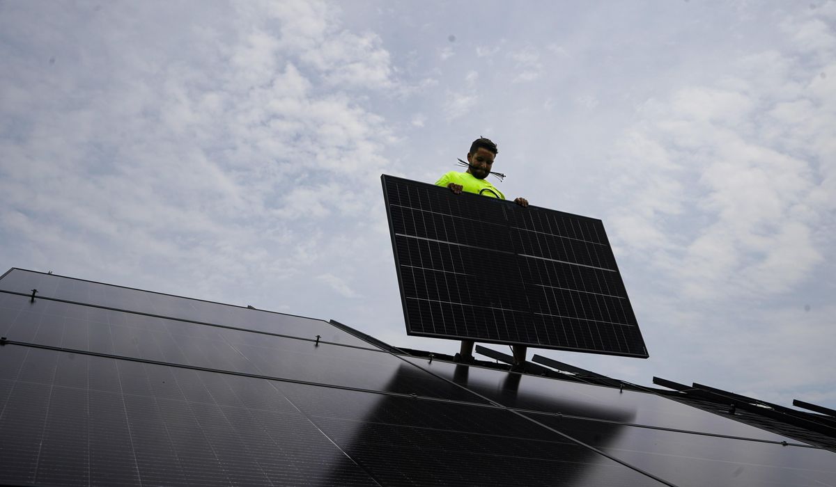 NextImg:Biden is marking Earth Day by announcing $7 billion in federal solar power grants