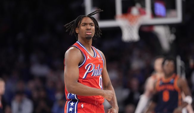 Philadelphia 76ers&#x27; Tyrese Maxey (0) gestures after making a 3-point basket during the second half of Game 2 in an NBA basketball first-round playoff series against the New York Knicks, Monday, April 22, 2024, in New York. (AP Photo/Frank Franklin II) **FILE**