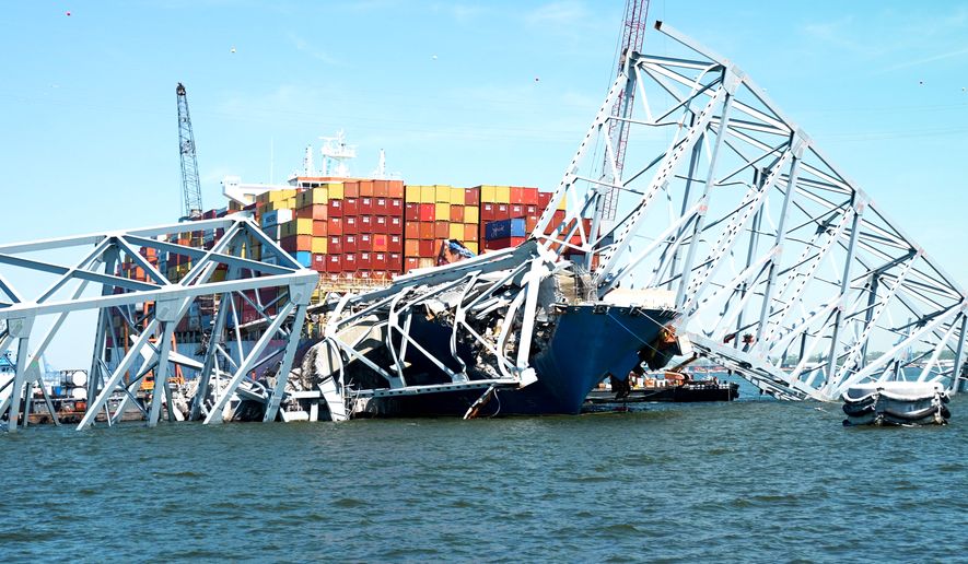 Aboard the U.S. Army Corps of Engineers‘ debris removal ship Reynolds provided a glimpse of Baltimore&#x27;s decimated Francis Scott Key Bridge and the effort to clear a major channel for waiting ships. Photo credit: David Gordon / The Washington Times.