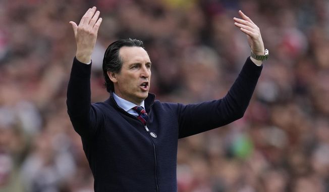Aston Villa&#x27;s head coach Unai Emery gestures during the English Premier League soccer match between Arsenal and Aston Villa at the Emirates stadium in London, Sunday, April 14, 2024. (AP Photo/Kirsty Wigglesworth)