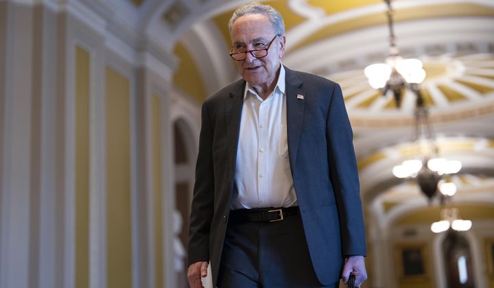 Senate Majority Leader Chuck Schumer, D-N.Y., arrives as the Senate prepares to advance the $95 billion aid package for Ukraine, Israel and Taiwan passed by the House, at the Capitol in Washington, Tuesday, April 23, 2024. (AP Photo/J. Scott Applewhite)