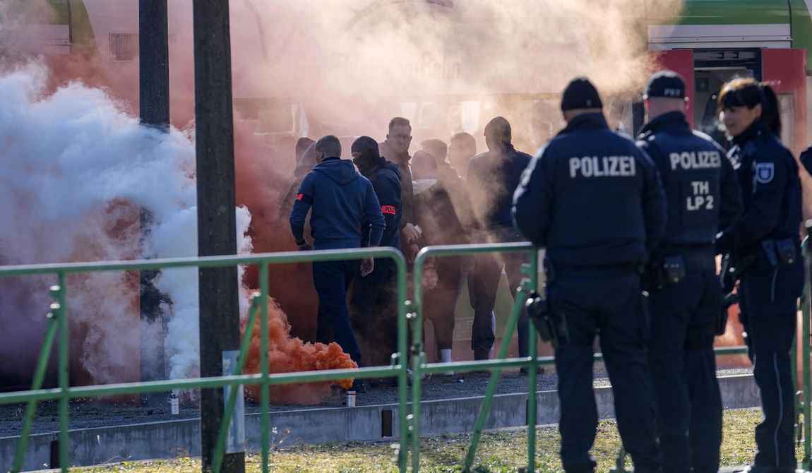 Hundreds of German local state police and federal police practice tactics in preparation for the European Championship in the village of Stützerbach, in Ilmenau, Germany, Tuesday, April 23, 2024. Germany hosts the European Championship from June 14 to July 14. Security is a priority with hundreds of thousands of fans expected for the 24-country soccer tournament. (AP Photo/Ebrahim Noroozi)