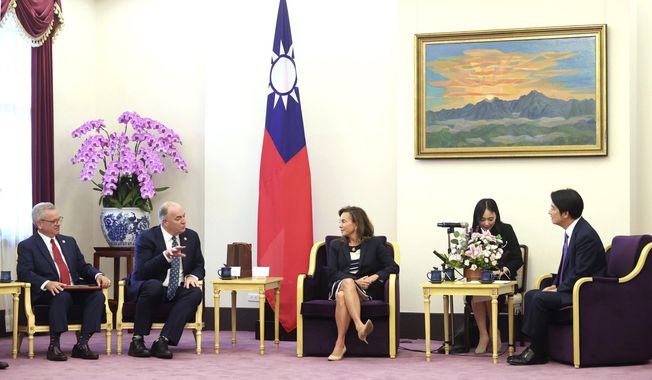 In this photo released by the Taiwan Presidential Office, from left Mark Alford, a member of the House Armed Services Committee, U.S. Democratic Congressman Dan Kildee, Lisa McClain, secretary-general of the Republican Caucus of the U.S. House of Representatives meets with Taiwan President-elect and Vice President Lai Ching-te in Taipei, Taiwan on Tuesday, April 23, 2024. McClain and Kildee jointly led a cross-party group of lawmakers to visit Taiwan from April 23 to 25 . Members also include Mark Alford, a member of the House Armed Services Committee. (Taiwan Presidential Office via AP)