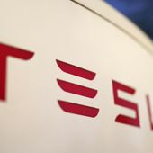 The logo for the Tesla Supercharger station is seen in Buford, Ga, April 22, 2021. Faced with falling global sales and a tumbling stock price, Tesla has slashed prices again on some of its electric vehicles and its “Full Self Driving” system. Tesla releases first-quarter earnings Tuesday, April 23, 2024. (AP Photo/Chris Carlson, File)