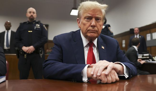 Former President Donald Trump waits for the start of proceedings in Manhattan criminal court, Tuesday, April 23, 2024, in New York. Before testimony resumes Tuesday, the judge will hold a hearing on prosecutors&#x27; request to sanction and fine Trump over social media posts they say violate a gag order prohibiting him from attacking key witnesses. (AP Photo/Yuki Iwamura, Pool)