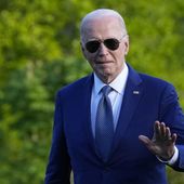 President Joe Biden waves as he walks across the South Lawn of the White House in Washington, Tuesday, April 23, 2024, after returning from a trip to Florida where he blamed Donald Trump for Florida&#x27;s upcoming abortion ban. (AP Photo/Susan Walsh)
