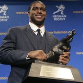 Heisman Trophy winner Reggie Bush of the University of Southern California smiles while posing for photos after a news conference in New York, Dec. 10, 2005. Reggie Bush has been reinstated as the 2005 Heisman Trophy winner, Wednesday, April 24, 2024, more than a decade after Southern California returned the award following an NCAA investigation that found he received what were impermissible benefits during his time with the Trojans.(AP Photo/Frank Franklin II) **FILE**