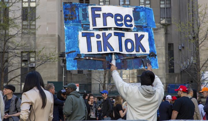 A man carries a Free TikTok sign in front of the courthouse where the hush-money trial of Donald Trump got underway April 15, 2024, in New York. The House has passed legislation Saturday, April 20, to ban TikTok in the U.S. if its China-based owner doesn&#x27;t sell its stake, sending it to the Senate as part of a larger package of bills that would send aid to Ukraine and Israel. House Republicans&#x27; decision to add the TikTok bill to the foreign aid package fast-tracked the legislation after it had stalled in the Senate. The aid bill is a priority for President Joe Biden that has broad congressional support. (AP Photo/Ted Shaffrey) **FILE**