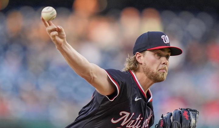 Washington Nationals starting pitcher Jake Irvin throws during the first inning of the team&#x27;s baseball game against the Los Angeles Dodgers at Nationals Park, Wednesday, April 24, 2024, in Washington.(AP Photo/Alex Brandon)